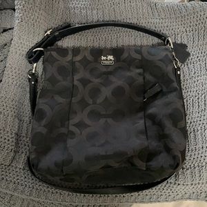 Black coach cross body or over the shoulder purse